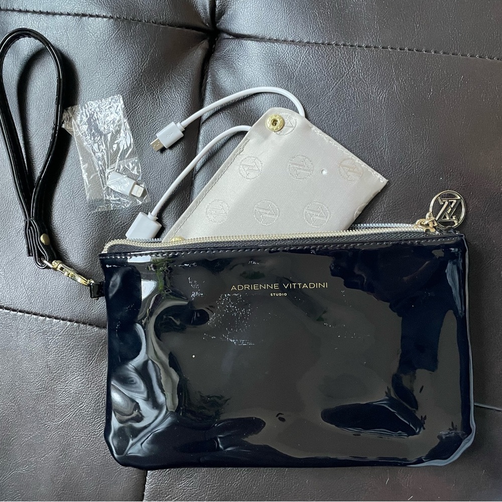 Adrienne Vittadini clutch with power bank for android/Apple
